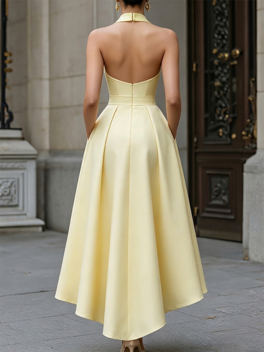 Robe longue Zafren jaune à encolure dos nu et nœud