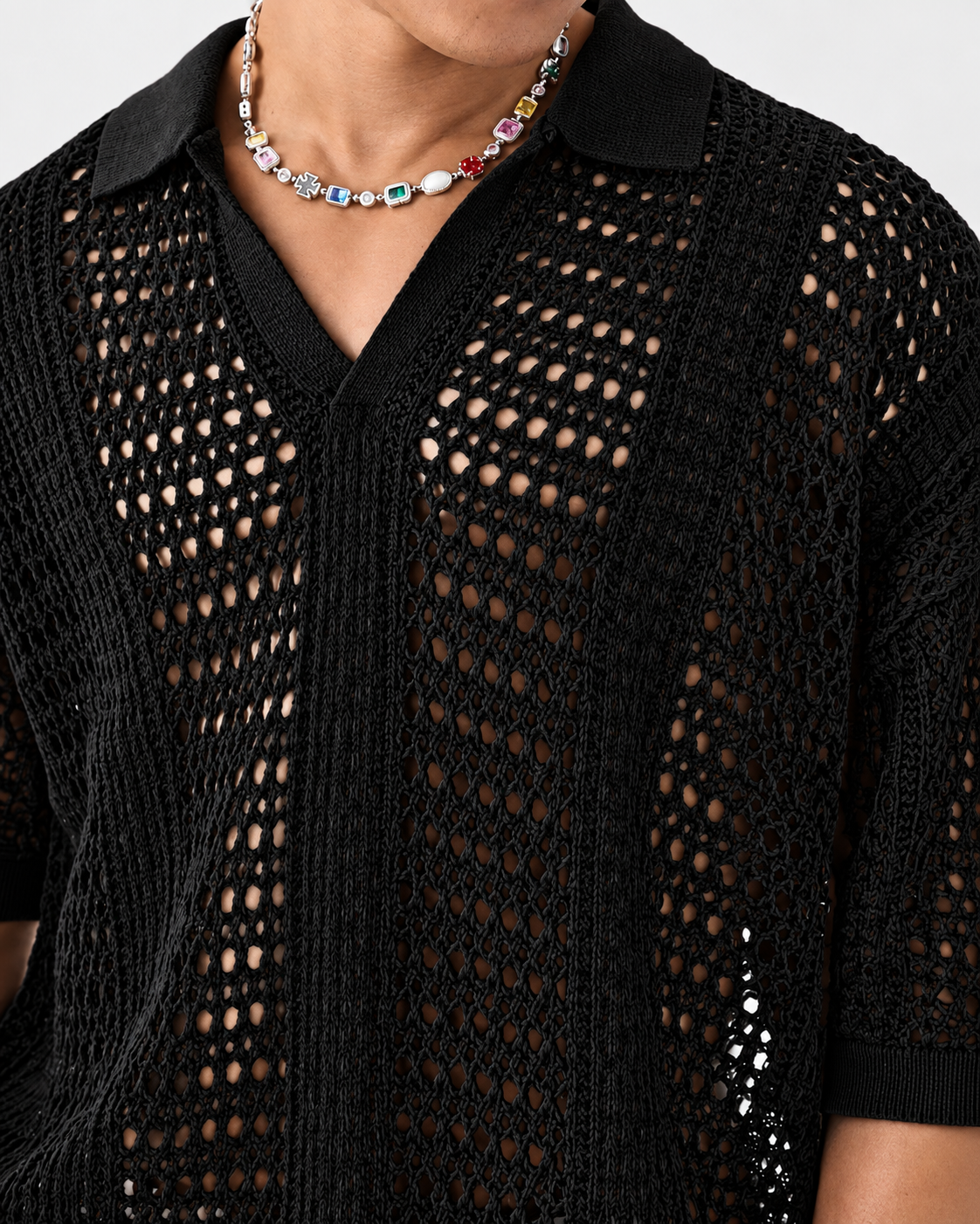 Polo de malha aberta com padrão entrelaçado
