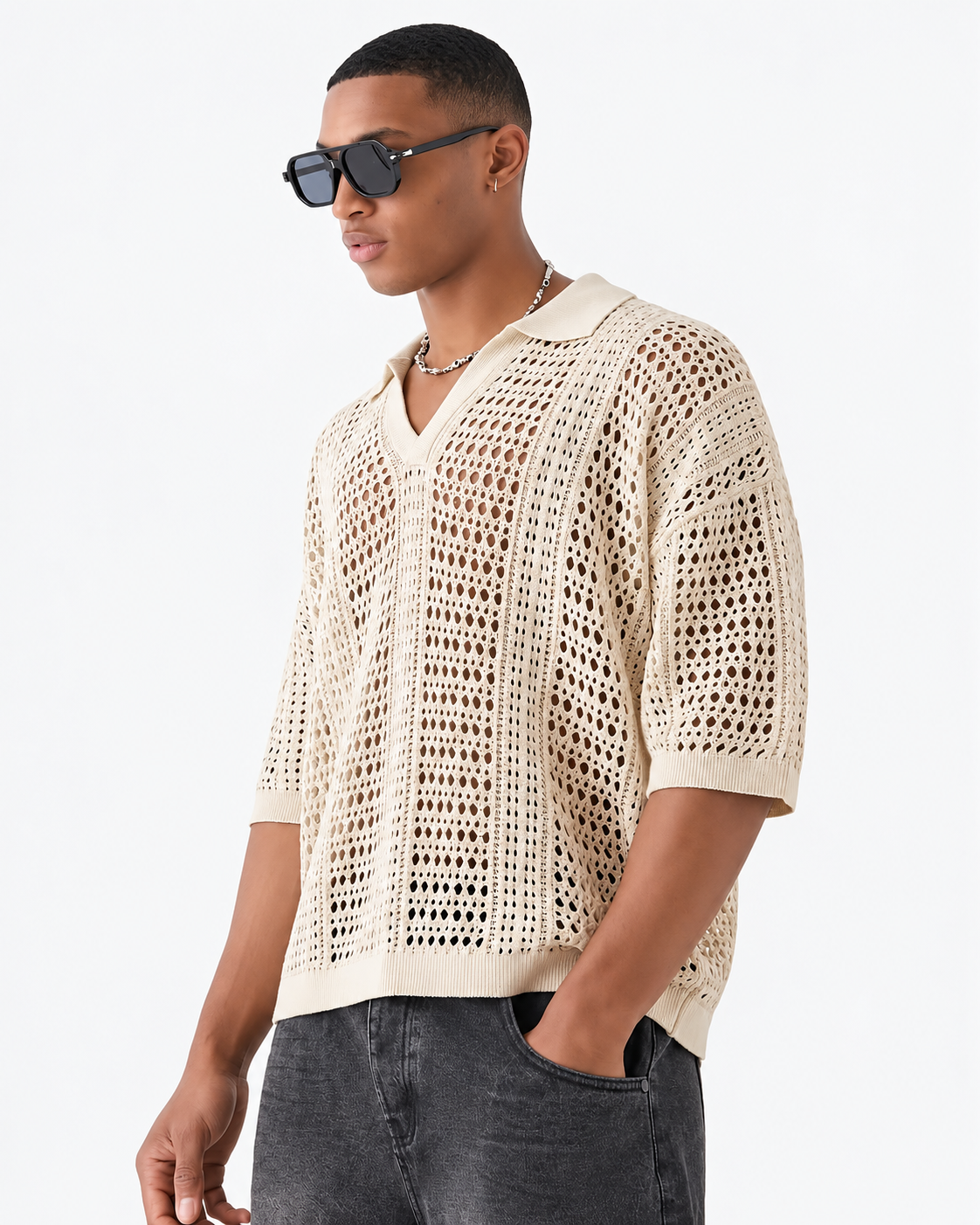 Polo de malha aberta com padrão entrelaçado