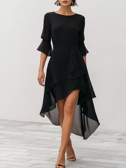 Zafren zwarte chiffonjurk met laagjes en asymmetrische zoom