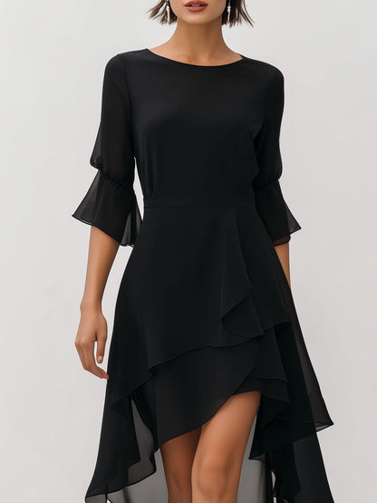 Zafren zwarte chiffonjurk met laagjes en asymmetrische zoom
