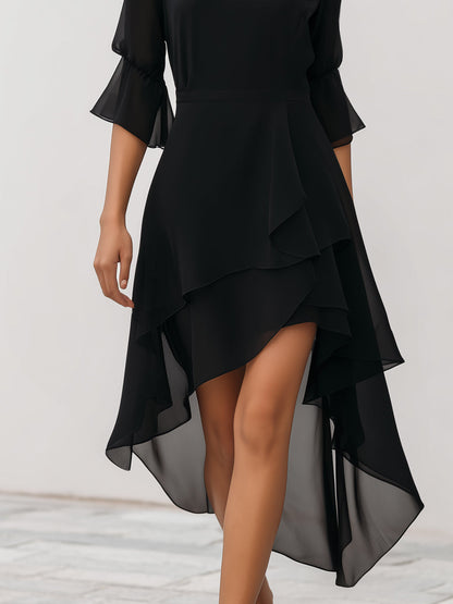 Zafren zwarte chiffonjurk met laagjes en asymmetrische zoom