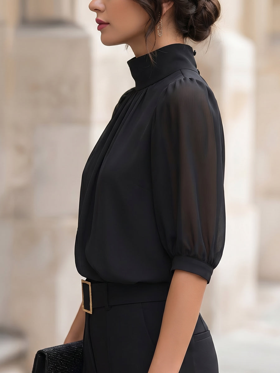 Zafren zwarte chiffonblouse met pofmouwen