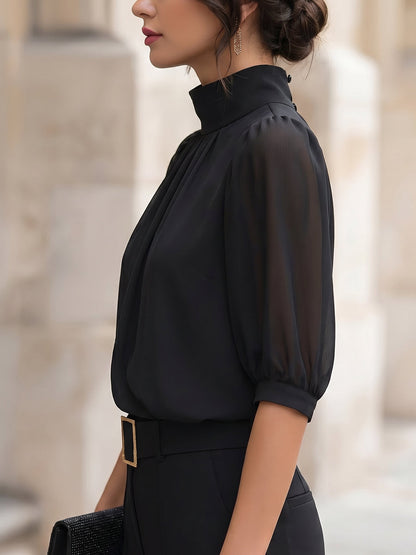 Zafren zwarte chiffonblouse met pofmouwen