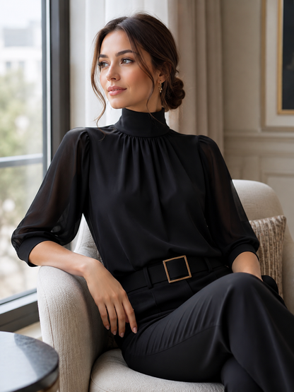 Zafren zwarte chiffonblouse met pofmouwen
