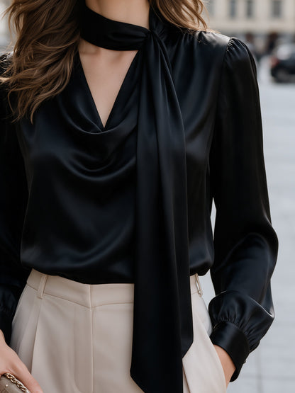 Zafren zwarte satijnen blouse met strikceintuur