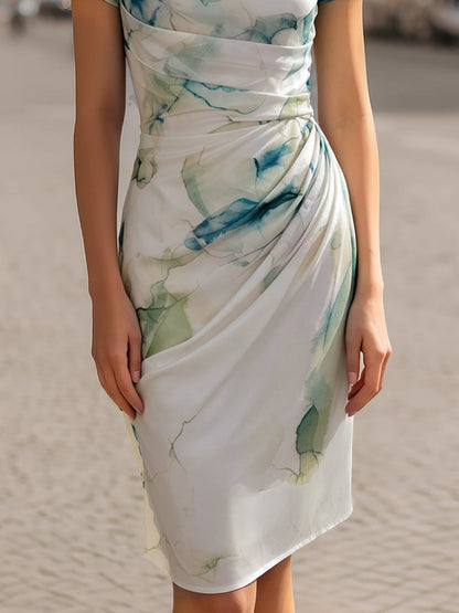 Zafren blauwe jurk met aquarelprint en watervalhals