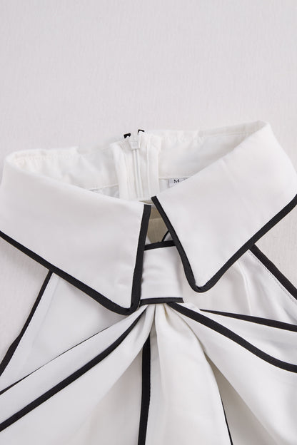 Blusa Zafren com acabamento contrastante e atilhos no pescoço