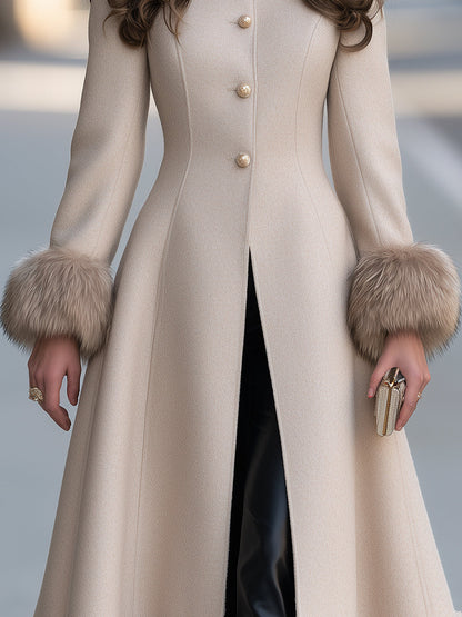 Cappotto svasato Zafren color crema con bordo in pelliccia