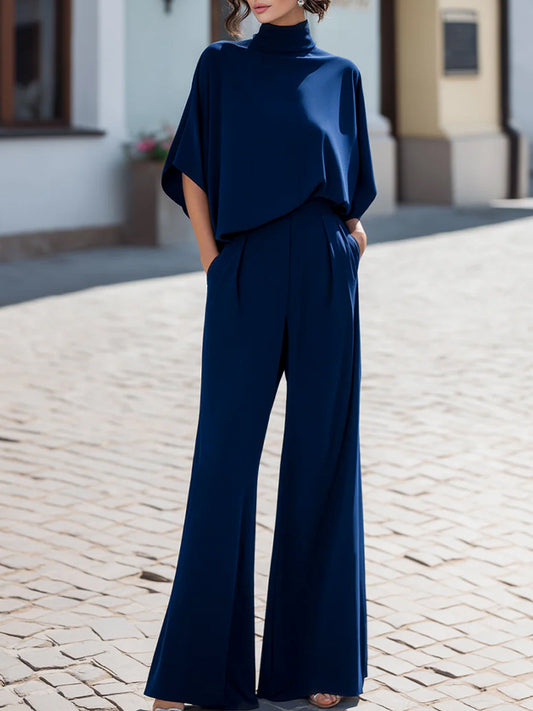 Conjunto Zafren azul marino de pantalón con drapeado y mangas murciélago