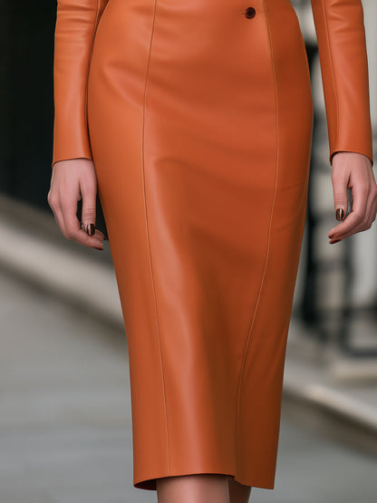 Zafren oranje kokerjurk van imitatieleer