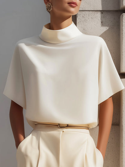 Blusa bianca con maniche dolman Zafren