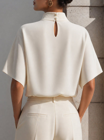Blusa bianca con maniche dolman Zafren