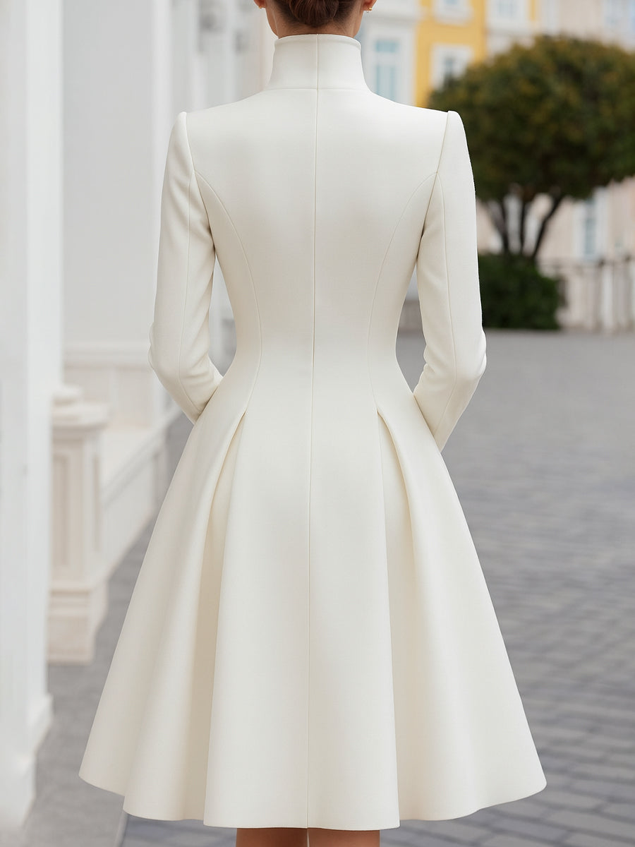 Vestido abrigo blanco de Zafren cruzado