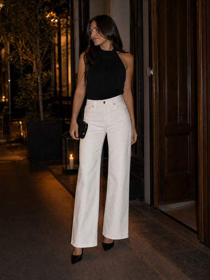 Jeans acampanados blancos con costuras doradas Zafren
