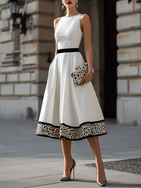Vestido midi blanco con bajo de leopardo Zafren